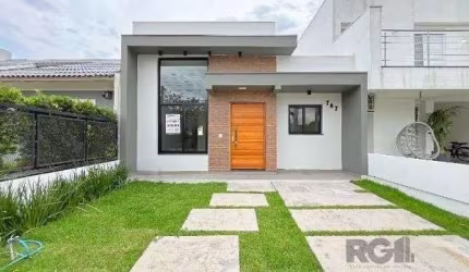 Casa em Porto Alegre, no bairro Hípica, com 3 dormitório(s), e 3 banheiros, à venda.