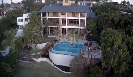 Casa com 4 dormitórios à venda, 1107 m² por R$ 3.700.000,00 - Vila Assunção - Porto Alegre/RS