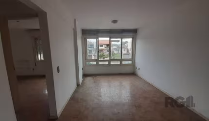 Ótimo apartamento com 2 dormitórios, 1 banheiro social, sala, no 2º andar, de frente.