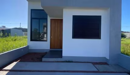 Casa térrea de 3 dormitórios sendo um suíte