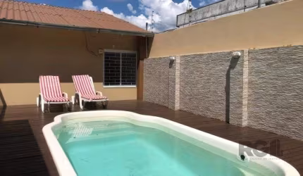 Casa com 3 dormitórios no bairro Rubem Berta