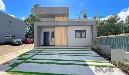 Casa em Porto Alegre, no bairro Hípica, com 3 dormitório(s), e 3 banheiros, à venda.