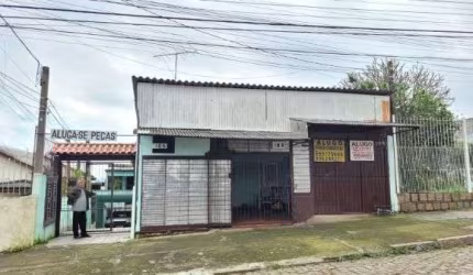 Casa em Porto Alegre, no bairro Santo Antônio, com 3 dormitório(s), e 3 banheiros, à venda.