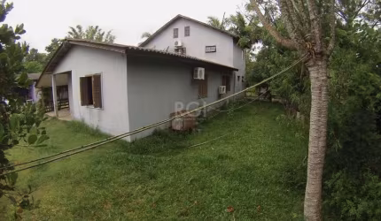 Casa 5 dormitórios no bairro Ponta Grossa
