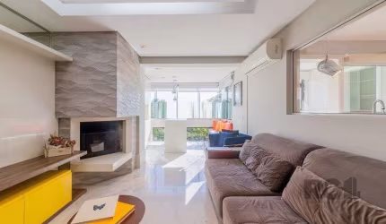 Vende-se excelente apartamento 2 quartos c/ 2 suítes, 2 vagas, living com lareira, sacada e churrasqueira - 98m² - Auxiliadora