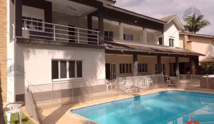 4dormitorios sendo 2 suites 10 vagas de garagem, piscina, fundo para o rio paraiba com deck para pescar e saida de barco casa com 400metros