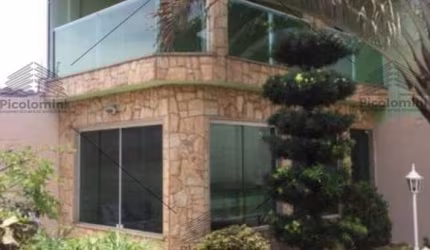 Sobrado a venda de 440 m² na Vila Carrão, 3 dormitórios, 3 suítes, 7 banheiros, quarto de empregada, sala de jogos, churrasqueira, piscina, 7 vagas