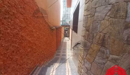 Casa a venda na Mooca, com 3 suites sendo a master com hidromassagem, sala com mezanino, escritorio, churrasqueira, 6 banheiros, 4 vagas, sacada