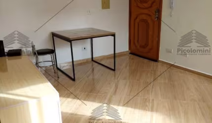 Apartamento a venda em Santo André, 2 dormitórios, banheiro, cozinha mobiliada, vaga de garagem coberta, área verde.