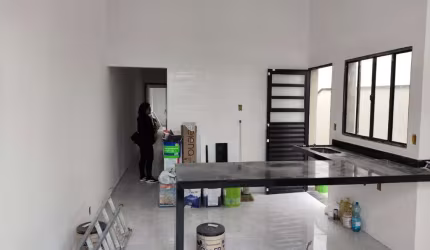 Essa casa conta com uma arquitetura moderna e sofisticada