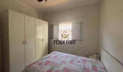Casa com 2 dormitórios à venda, 77 m² por R$ 450.000,00 - Vila Guilhermina - Praia Grande/SP