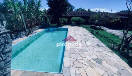 Casa com 6 dormitórios à venda, 350 m² por R$ 1.000.000,00 - Porto Novo - Caraguatatuba/SP