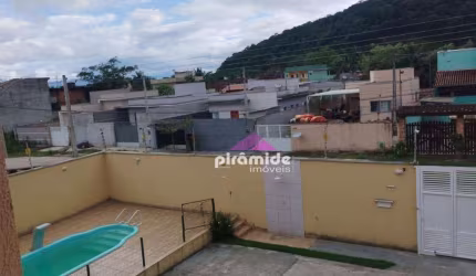 Casa com 2 dormitórios à venda, 75 m² por R$ 420.000,00 - Massaguaçu - Caraguatatuba/SP