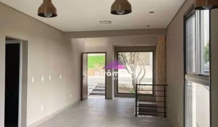 Casa com  3 dormitórios, sendo 1 suíte à venda, 220m², por R$ 1.250.000,00 - Condomínio Fechado - Caçapava/SP