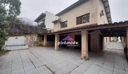 Casa com 4 dormitórios à venda, 300 m² por R$ 950.000,00 - Massaguaçu - Caraguatatuba/SP