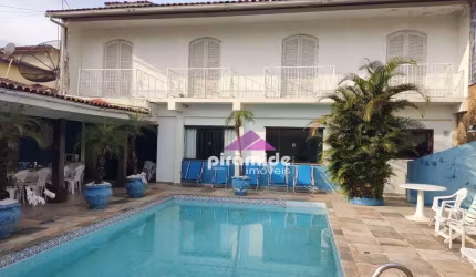 Casa com 5 dormitórios à venda, 393 m² por R$ 2.500.000,00 - Indaiá - Caraguatatuba/SP