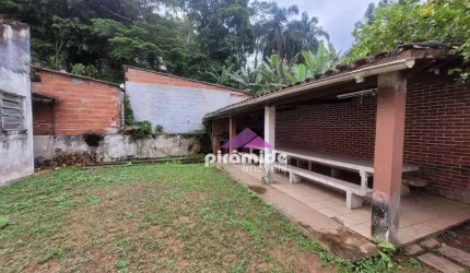Casa com 3 dormitórios à venda, 214 m² por R$ 590.000,00 - Massaguaçu - Caraguatatuba/SP