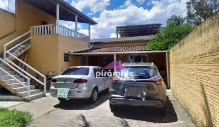 Casa com 2 dormitórios à venda, 120 m² por R$ 485.000,00 - Balneário dos Golfinhos - Caraguatatuba/SP