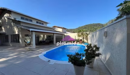 Casa com 3 dormitórios à venda, 240 m² por R$ 2.300.000,00 - Massaguaçu - Caraguatatuba/SP