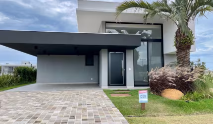 Casa em condomínio fechado com 3 quartos à venda na Ipanema, 521, Curumim, Capão da Canoa por R$ 1.990.000