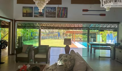 Linda Casa 4 suítes, em condomínio frente mar bem próximo da Vila !