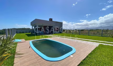 Casa com 3 quartos à venda na Rua Lindoia, Jardim Raiante, Arroio do Sal, 96 m2 por R$ 595.000