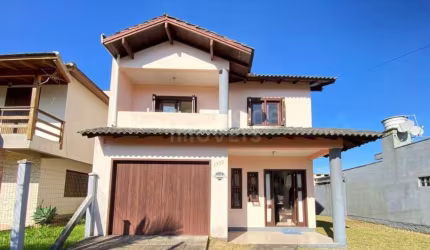 Casa com 3 quartos à venda na Rua das Amendoeiras, 1050, Quatro Lagos, Arroio do Sal por R$ 400.000