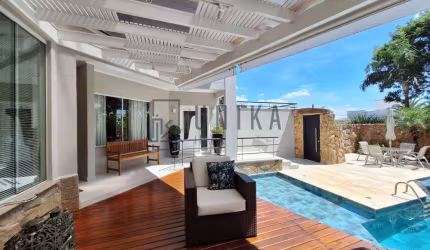 Luxuosa casa em condomínio à venda em Campinas-SP no Loteamento Alphaville Campinas: 4 quartos, 4 suítes, 3 salas, 6 banheiros, 6 vagas de garagem, 370m² de área.