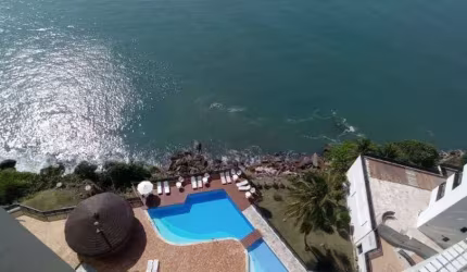 Apartamento com 4 dormitórios à venda, 170 m² por R$ 1.800.000,00 - Praia das Asturias Frente Mar - Guarujá/SP