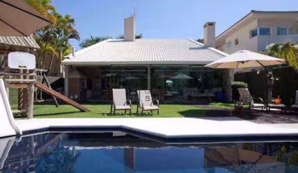 Casa com 4 dormitórios à venda, 314 m² por R$ 1.930.000,00 - Praia do Pernambuco - Guarujá/SP