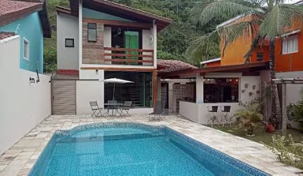 Casa com 3 suítes à venda, 158 m² por R$ 1.200.000 - Praia do Guaiúba / Tombo - Guarujá/SP