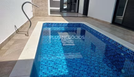 Prepare-se para se encantar com esta residência deslumbrante, situada no prestigiado condomínio Le