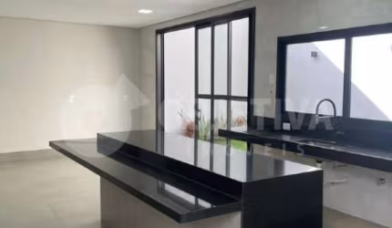 Excelente casa estilo sobrado a venda no bairro Praça Alto Umuarama em Uberlândia