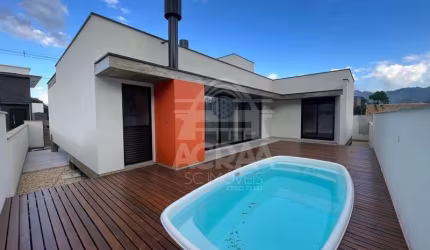 Casa nova com 3 quartos, piscina e área de festas na Guabiruba