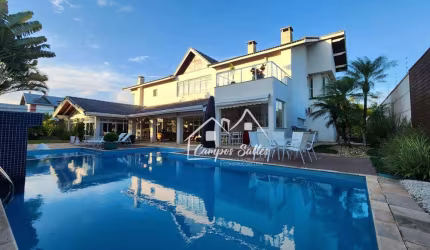 Sobrado com 6 dormitórios à venda, 482 m² por R$ 3.000.000,00 - Bougainvillee II - Peruíbe/SP