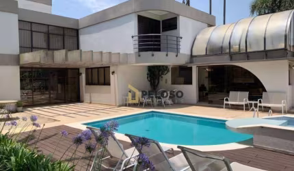 Casa em condomínio fechado | 467m² |  4 suítes |