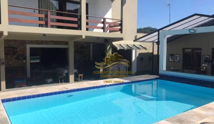 Casa com 7 dormitórios à venda, 690 m² por R$ 1.800.000,00 - Praia do Pernambuco - Guarujá/SP