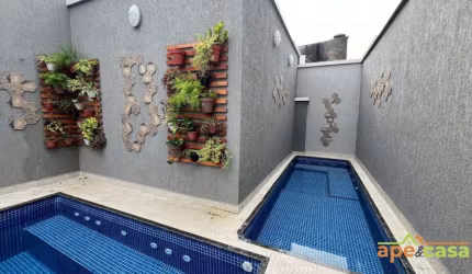 Casa em condomínio fechado com 2 quartos à venda no Balneário Maracanã, Praia Grande  por R$ 330.000