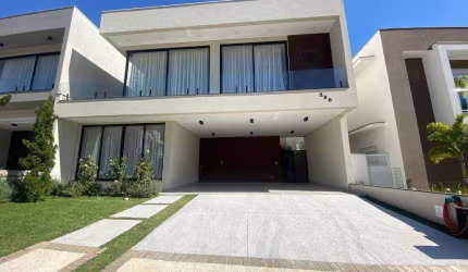 Condomínio Duas Marias - Casa D10 Casa muito elegante, com espaços generosos e com arquitetura moderna. Projeto único e exclusivo. Área social com vista total para jardim e piscina, espaços amplos e i