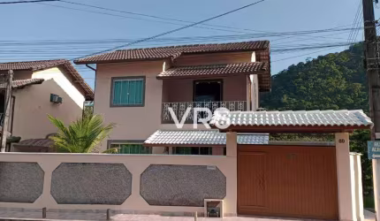 Casa com 2 dormitórios à venda, 108 m² por R$ 425.000,00 - Parada Modelo - Guapimirim/RJ