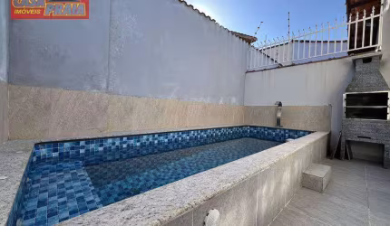 Casa em Mongaguá com piscina a 50 metros da praia 2 quartos 86 m² por R$ 420.000 - Balneário Itaoca