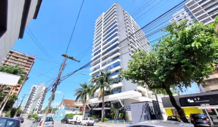 Apartamento moderno 1 suíte, sala de estar e jantar, cozinha com armários, sacada com churrasqueira e área de serviço.