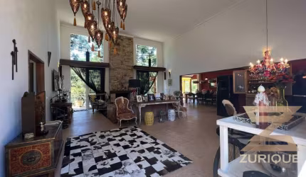 Casa com 4 dormitórios à venda, 315 m² por R$ 3.700.000,00 - Condomínio Recanto do Sol - Campos do Jordão/SP