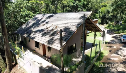 Casa com 3 dormitórios à venda, 190 m² por R$ 900.000,00 - Centro - Campos do Jordão/SP