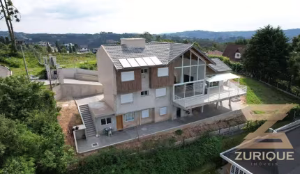 Casa com 4 dormitórios à venda, 330 m² por R$ 3.000.000,00 - Alto Do Capivari - Campos do Jordão/SP