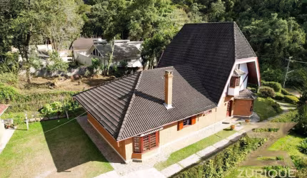 Casa com 4 dormitórios à venda, 236 m² por R$ 1.100.000,00 - Vila Capivari - Campos do Jordão/SP