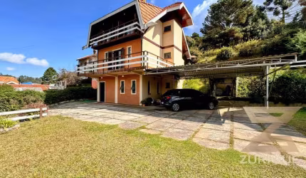 Casa com 3 dormitórios à venda, 161 m² por R$ 1.200.000,00 - Nova Suíça - Campos do Jordão/SP