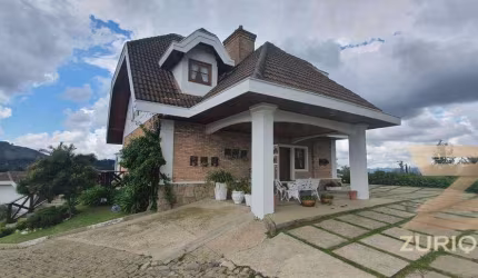 Casa com 4 dormitórios à venda, 375 m² por R$ 1.800.000,00 - Alataia - Campos do Jordão/SP