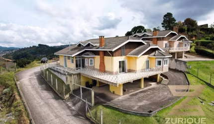 Casa com 6 dormitórios à venda, 260 m² por R$ 1.800.000,00 - Alataia - Campos do Jordão/SP