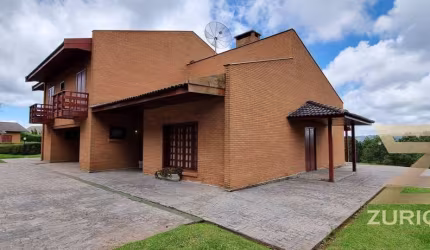 Casa com 6 dormitórios à venda, 450 m² por R$ 2.500.000,00 - Vila Porã - Campos do Jordão/SP